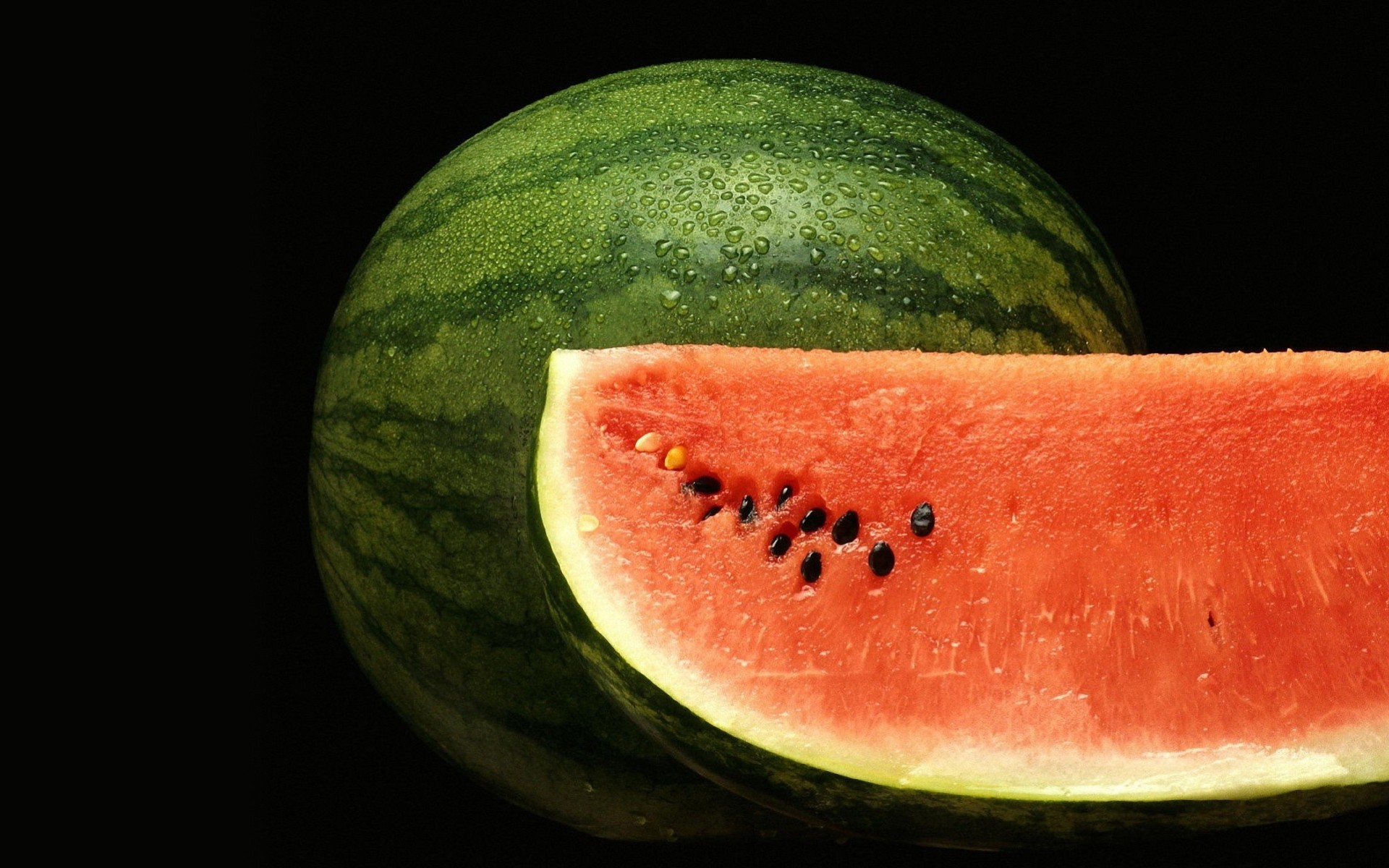 wassermelone makro wassertropfen schwarzer hintergrund natur