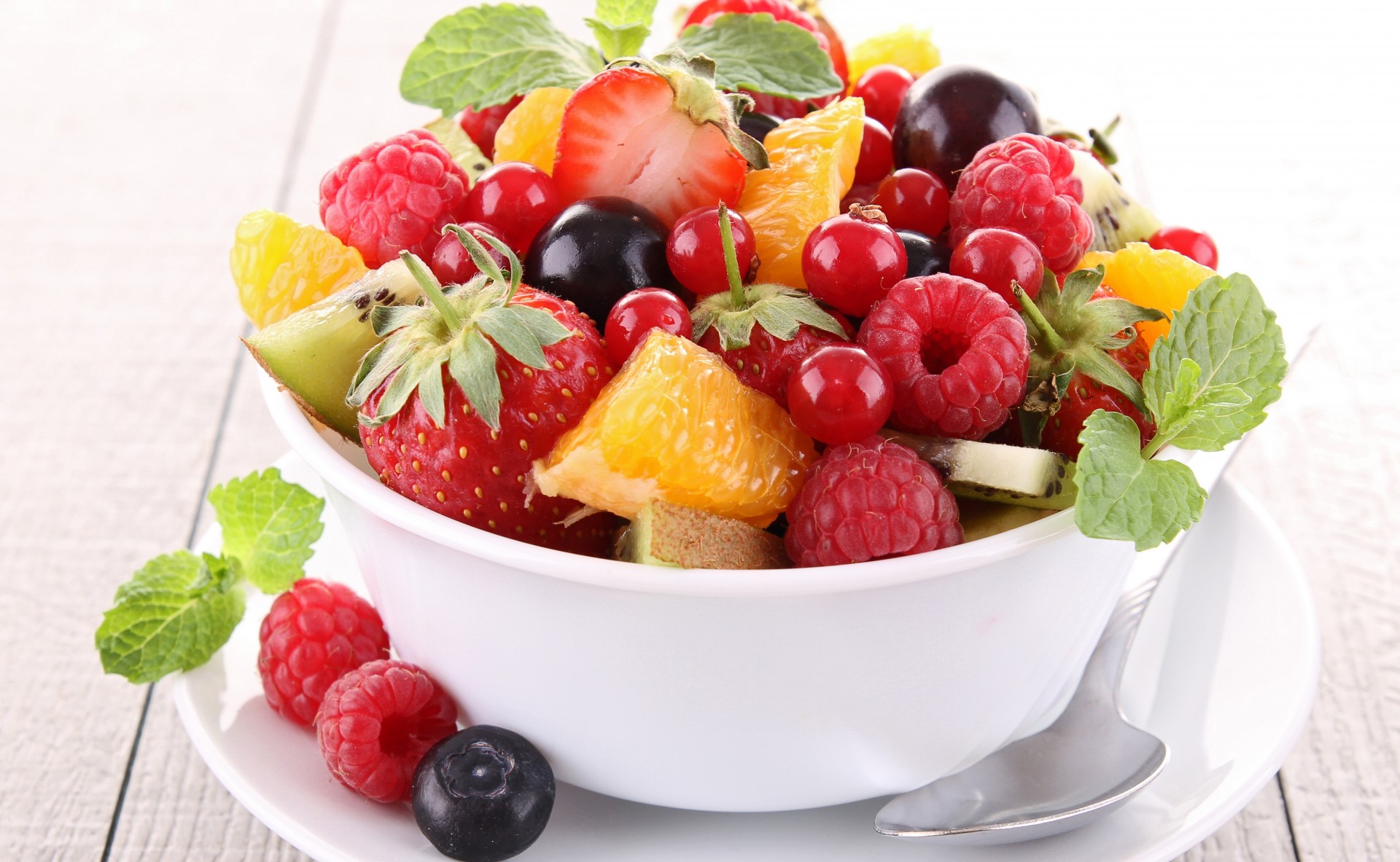 raspberry blueberries fruits berries kiwi orange salad