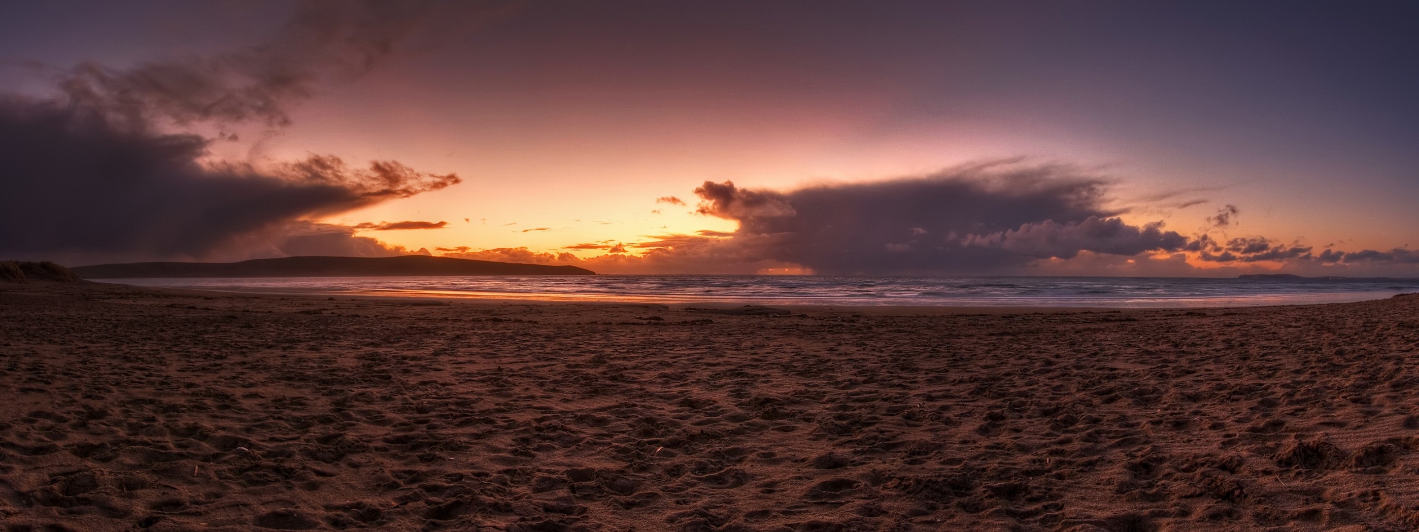 coucher de soleil plage sable mer