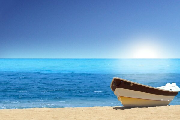 Boat on the beach by the sea