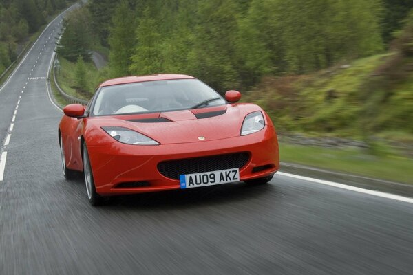 Red lotus evora on the track