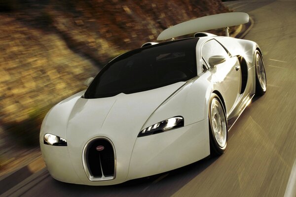 Modern bugatti rushes along the highway