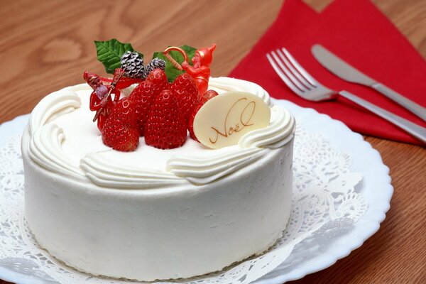 A beautiful cake with berries on a plate