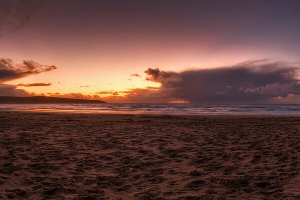 Sea sunset on the beach with sand