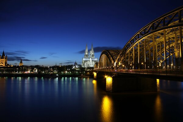 Evening Cologne buildings and bridges