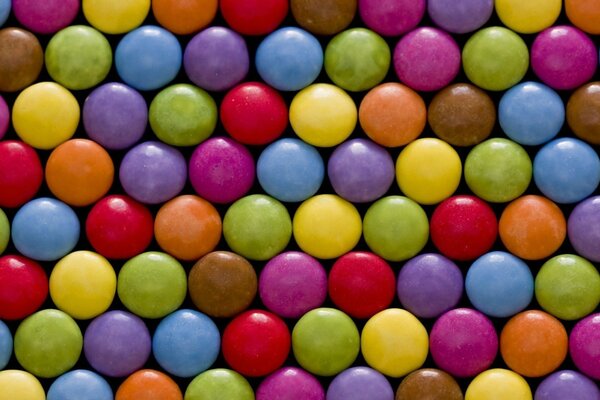 Texture of multicolored round candies