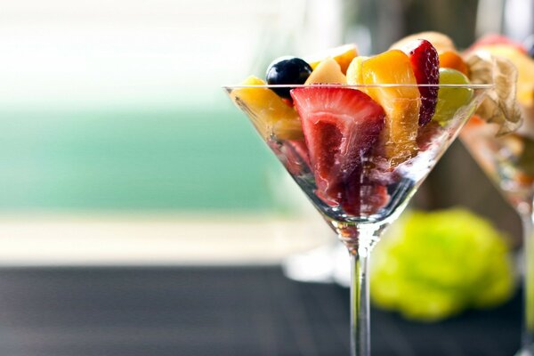 Delicious cocktail in a glass of fruit