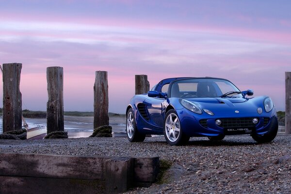 Blue convertible on a beautiful background