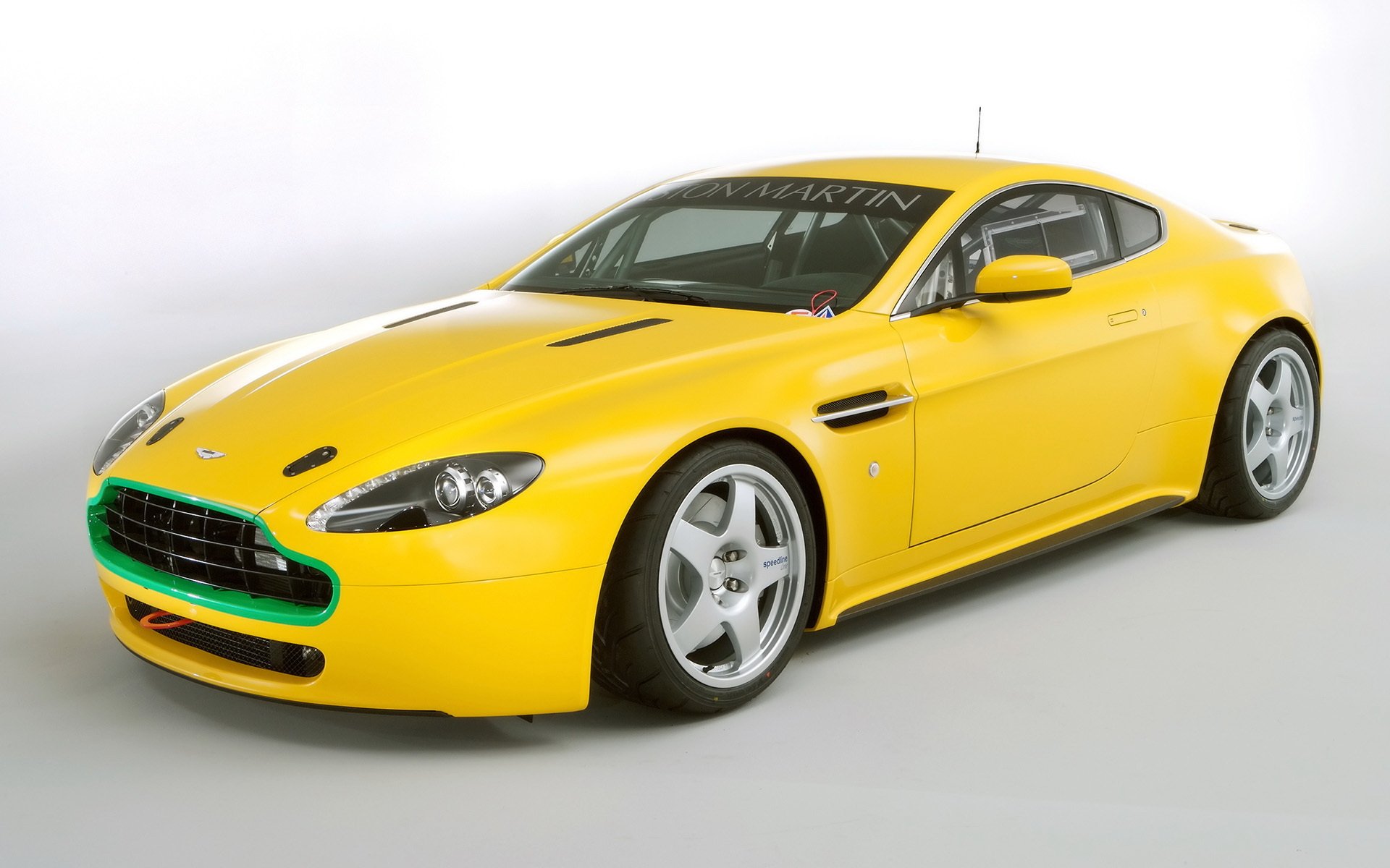 aston martin aston martin yellow car