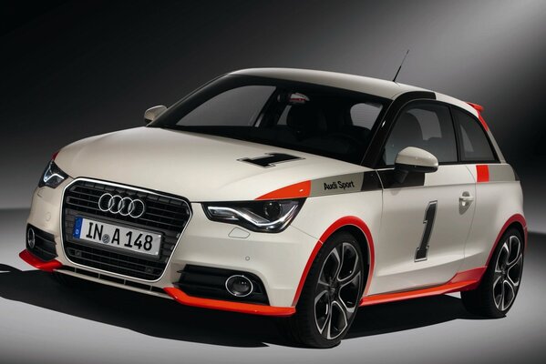 Coche deportivo Audi A1 en blanco y rojo