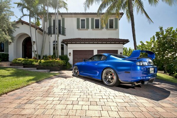 Blue Toyota car at home