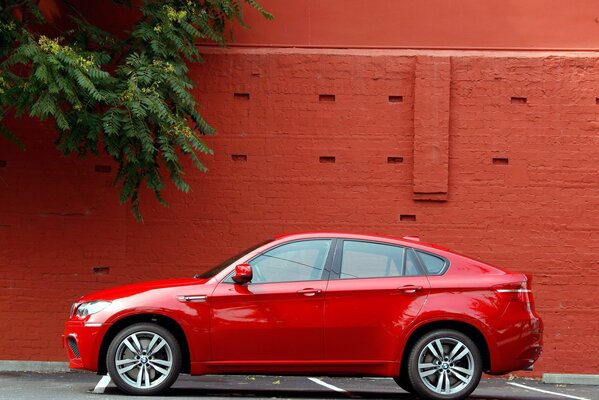 Car red wheels wall