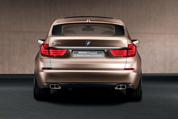 Golden bmw car, rear view