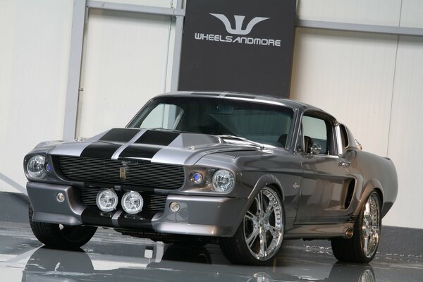 Grey sports Ford in the garage