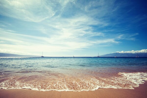 View of the quiet waves of the azure sea