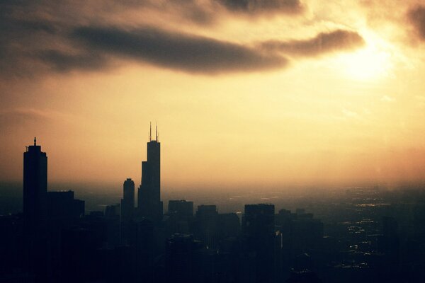 Megapolis in the haze of a charming sunset