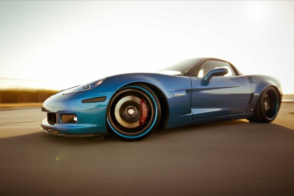 Blue Chevrolet Corvette Z06 on the sand