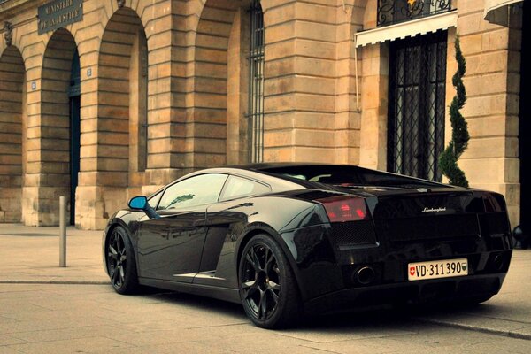 Parked black lamborghini car