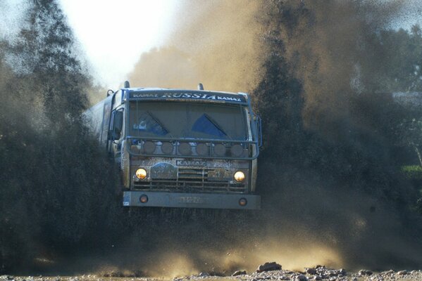 Truck on the road in the mud