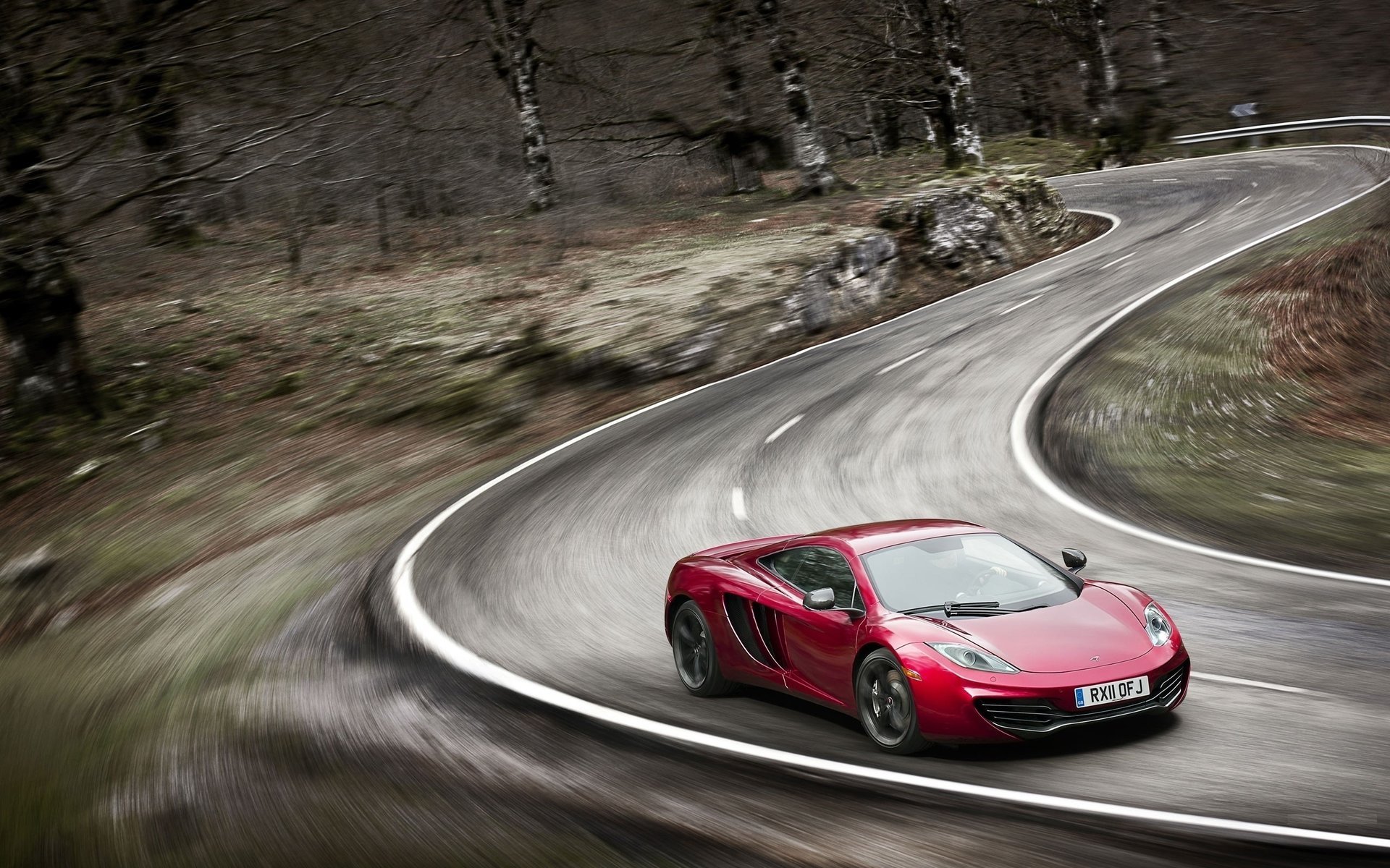 mclaren mp4-12c sports car road turn speed blur