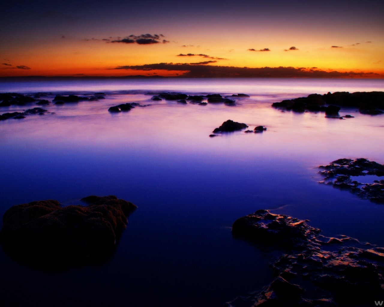 unset clouds stone