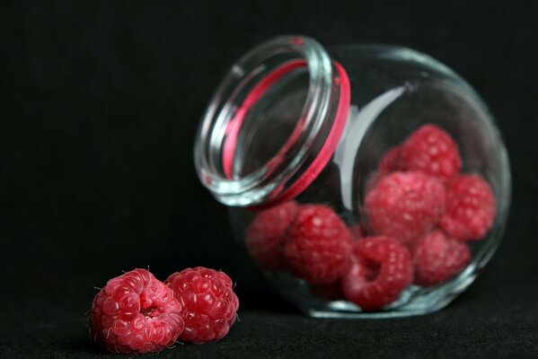 Raspberries in a glass jar