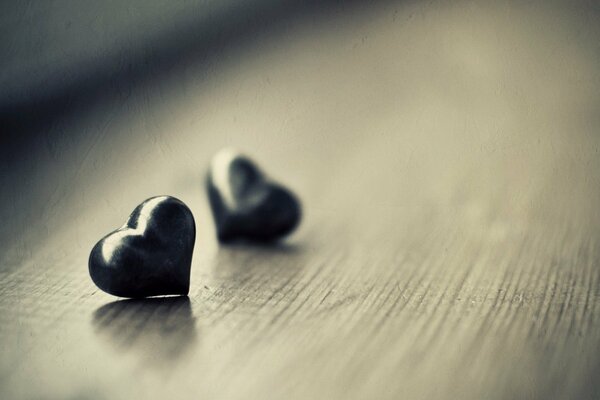 Dos corazones de piedra bien Escritorio macro tiro