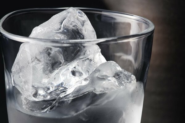 Ice in a glass of water, macro image