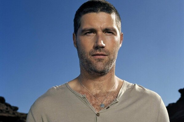 Matthew Fox against the sky