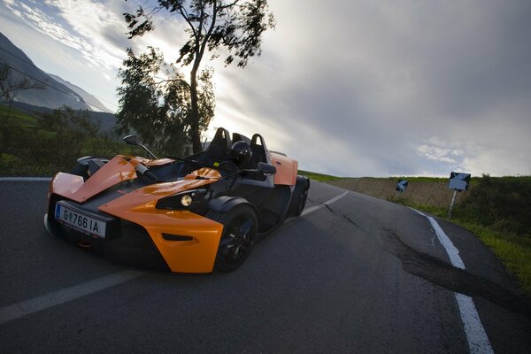 Racing car on the road on the turn