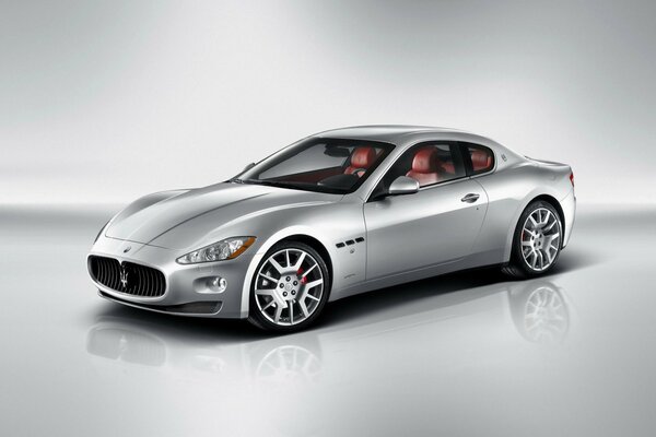 A beautiful Maserati car with a leather interior inside