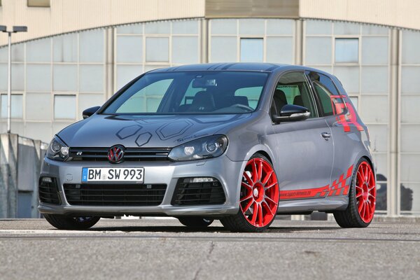 Sports wheels on a silver vw golf