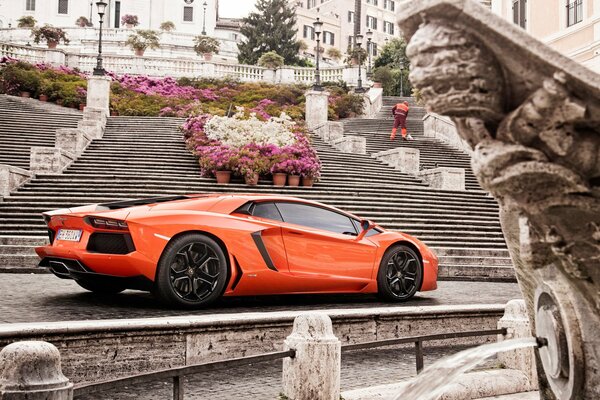 Lamborghini rojo esperando a Cenicienta