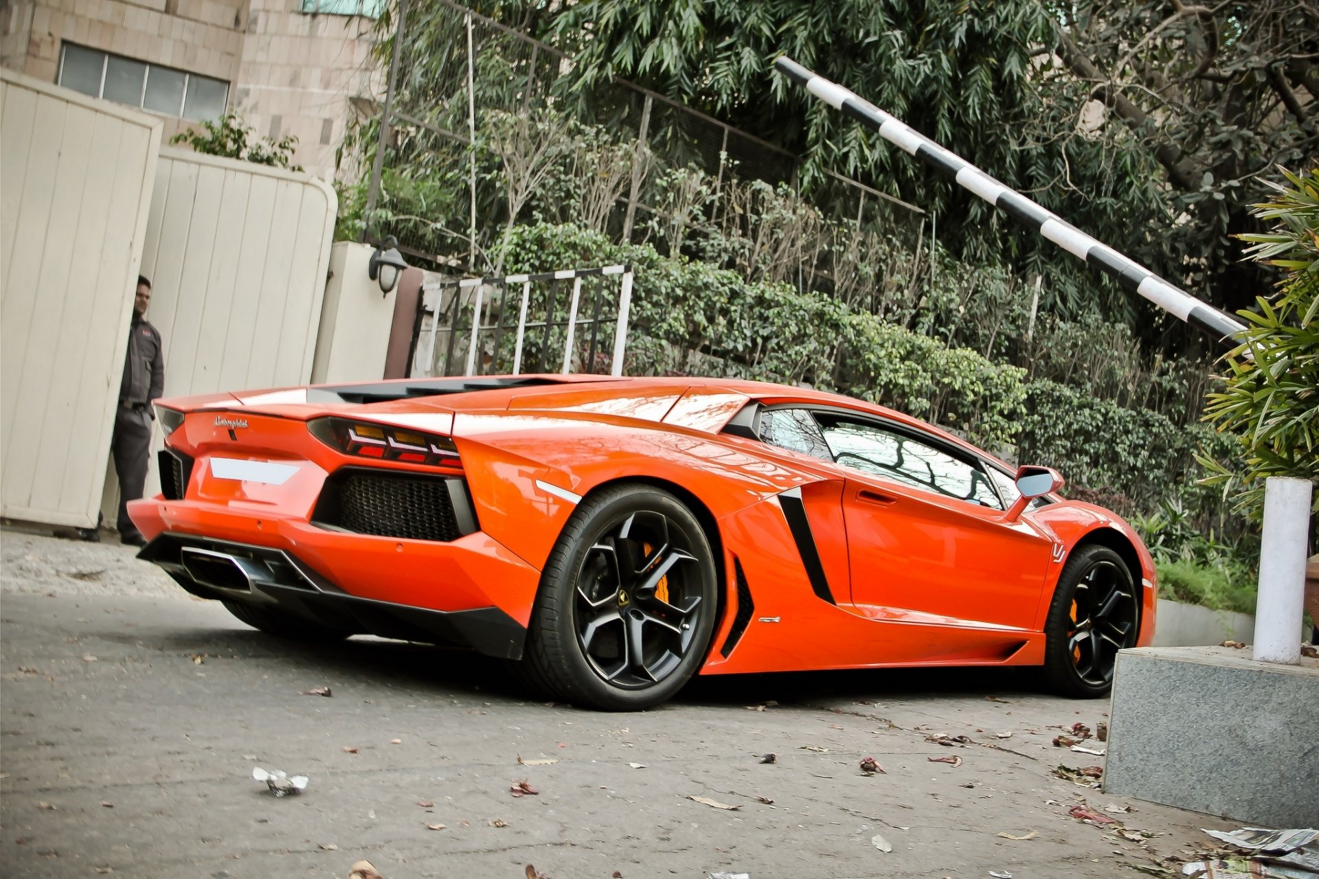 lamborghini aventador lp700-4 orange lamborghini aventador side view fence trees gate