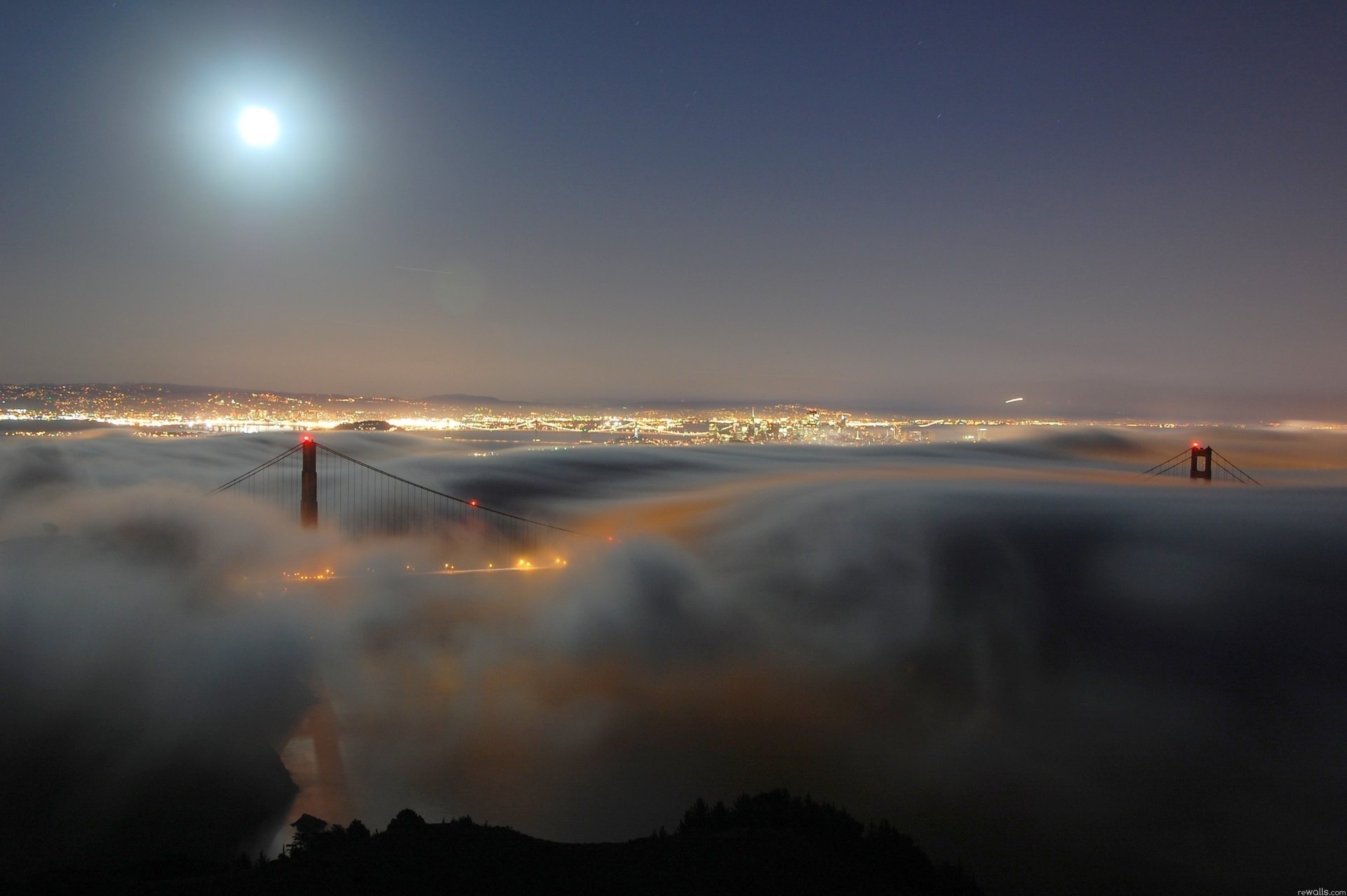 the city lights fog haze the evening bridge night the moon