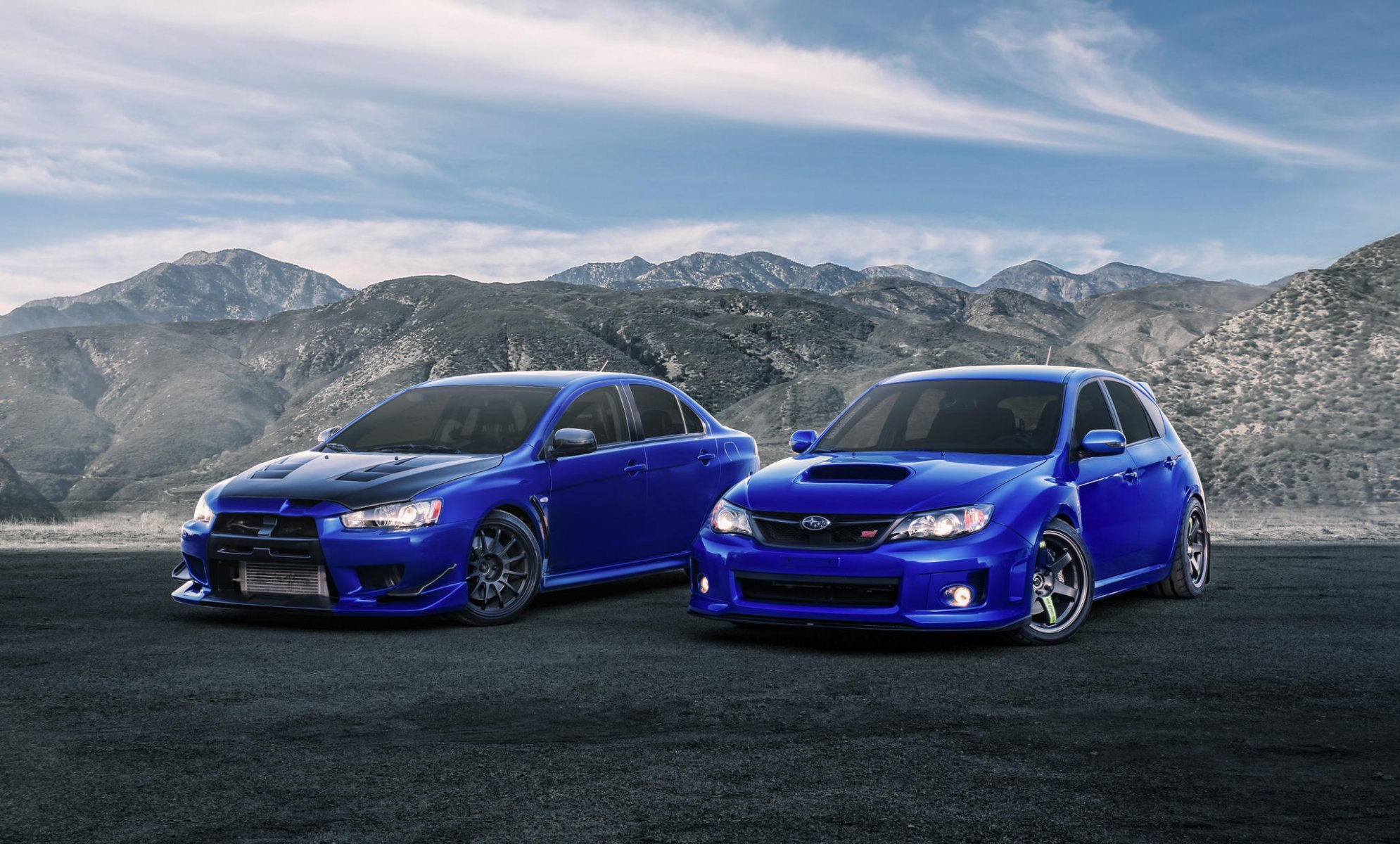 mitsubishi lancer evolution x subaru impreza sti blue front