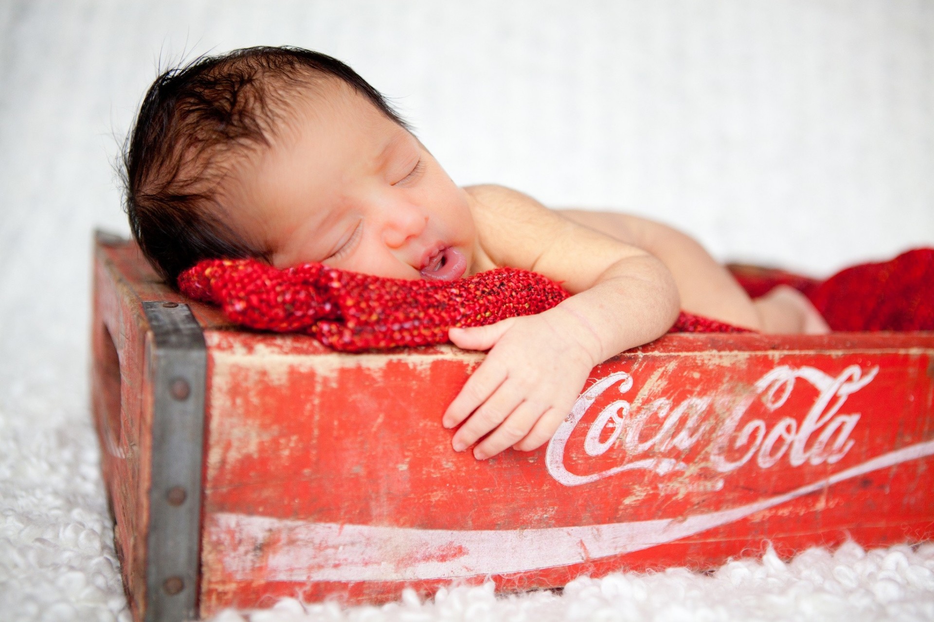 cajón bebé coca-cola dormir