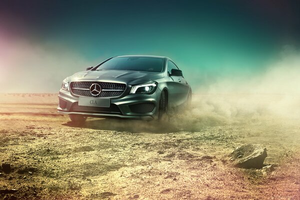 Skidding silver Mercedes-Benz cla in the desert