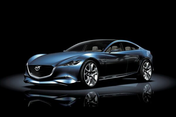 Stylish, modern Mazda car on a dark background