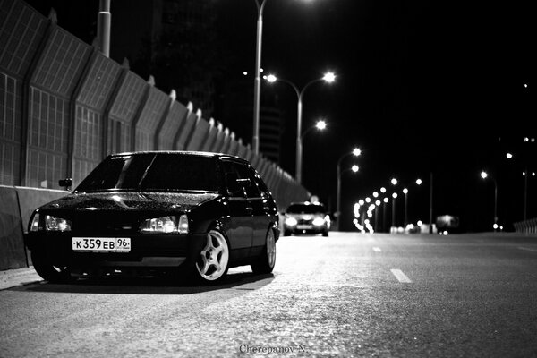 VAZ with white disks on the night road