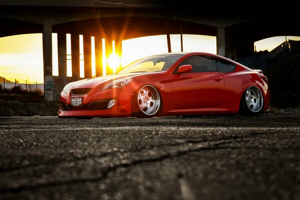 Voiture rouge hyundai genesis