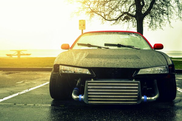 Nissan Sylvia in the rain at sunset