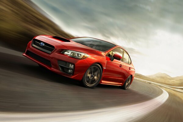 Subaru wrx rojo conduciendo por la carretera