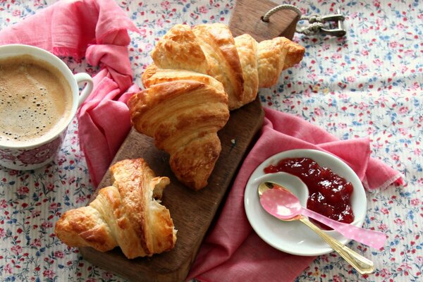 Fresh croissant and coffee for breakfast