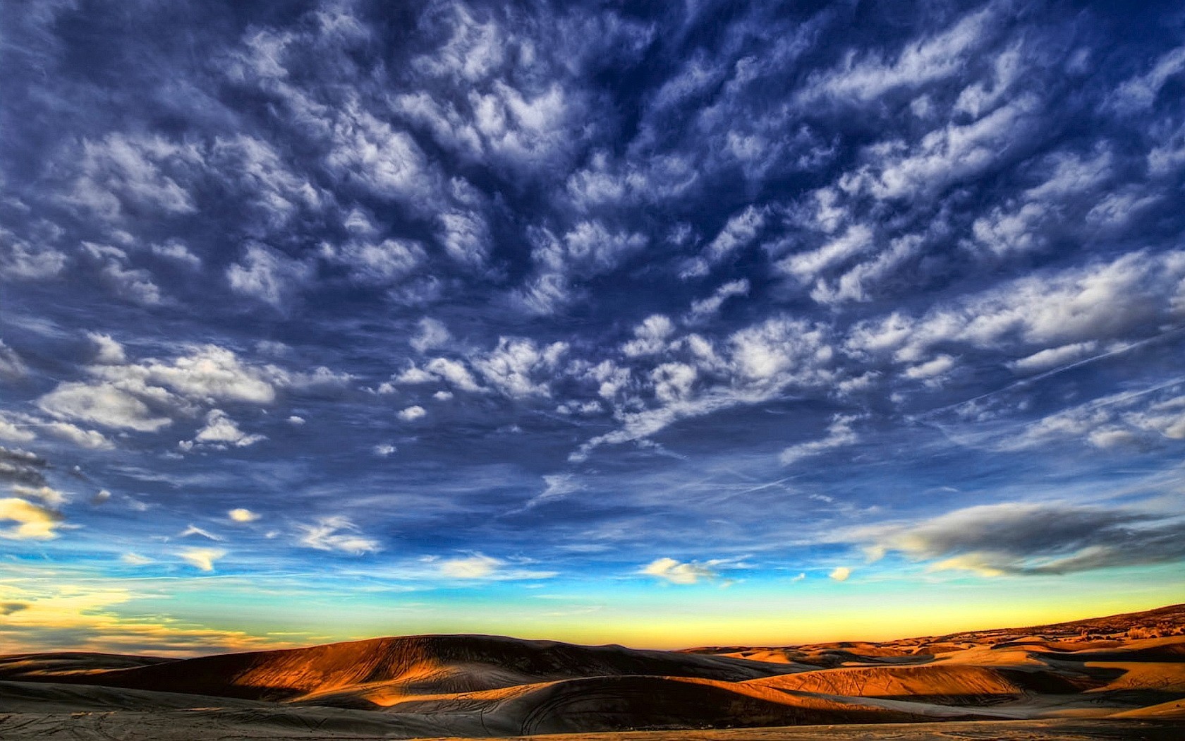 nuvole cielo colline deserto