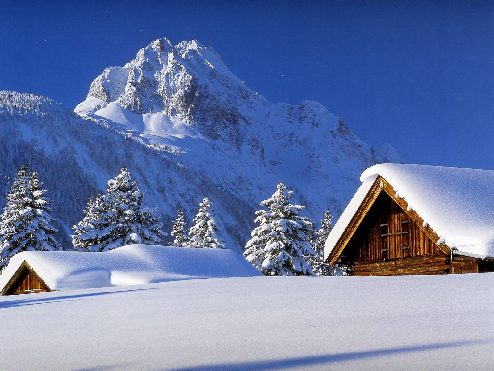 mountain winter snow houses roof