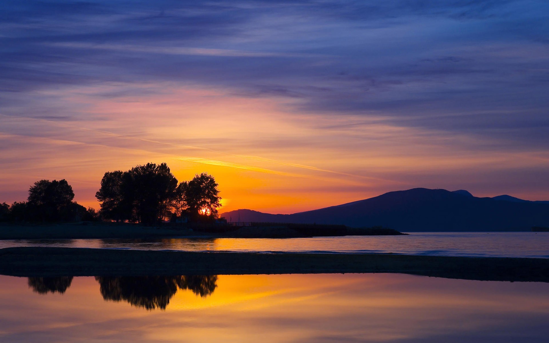 night sunset water tree hill