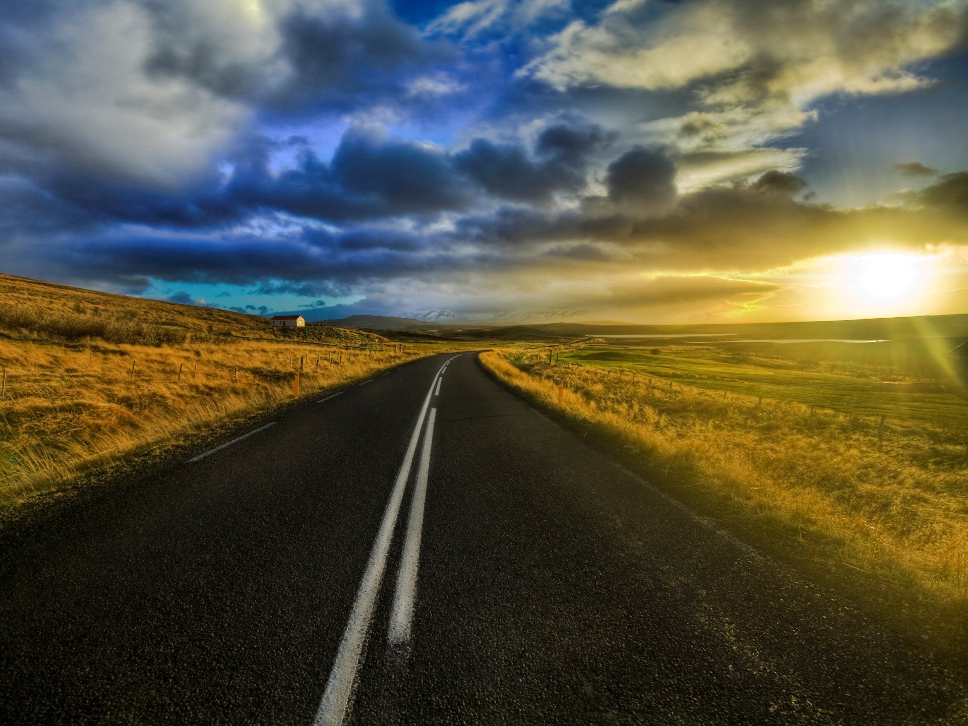 road clouds sun