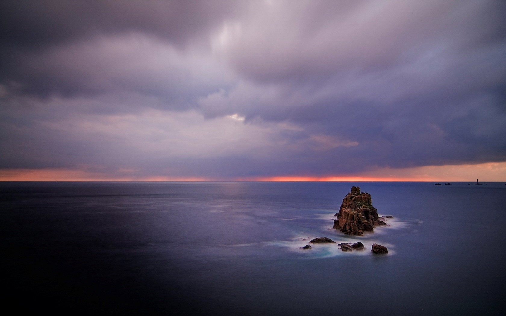 nubes horizonte rocas mar