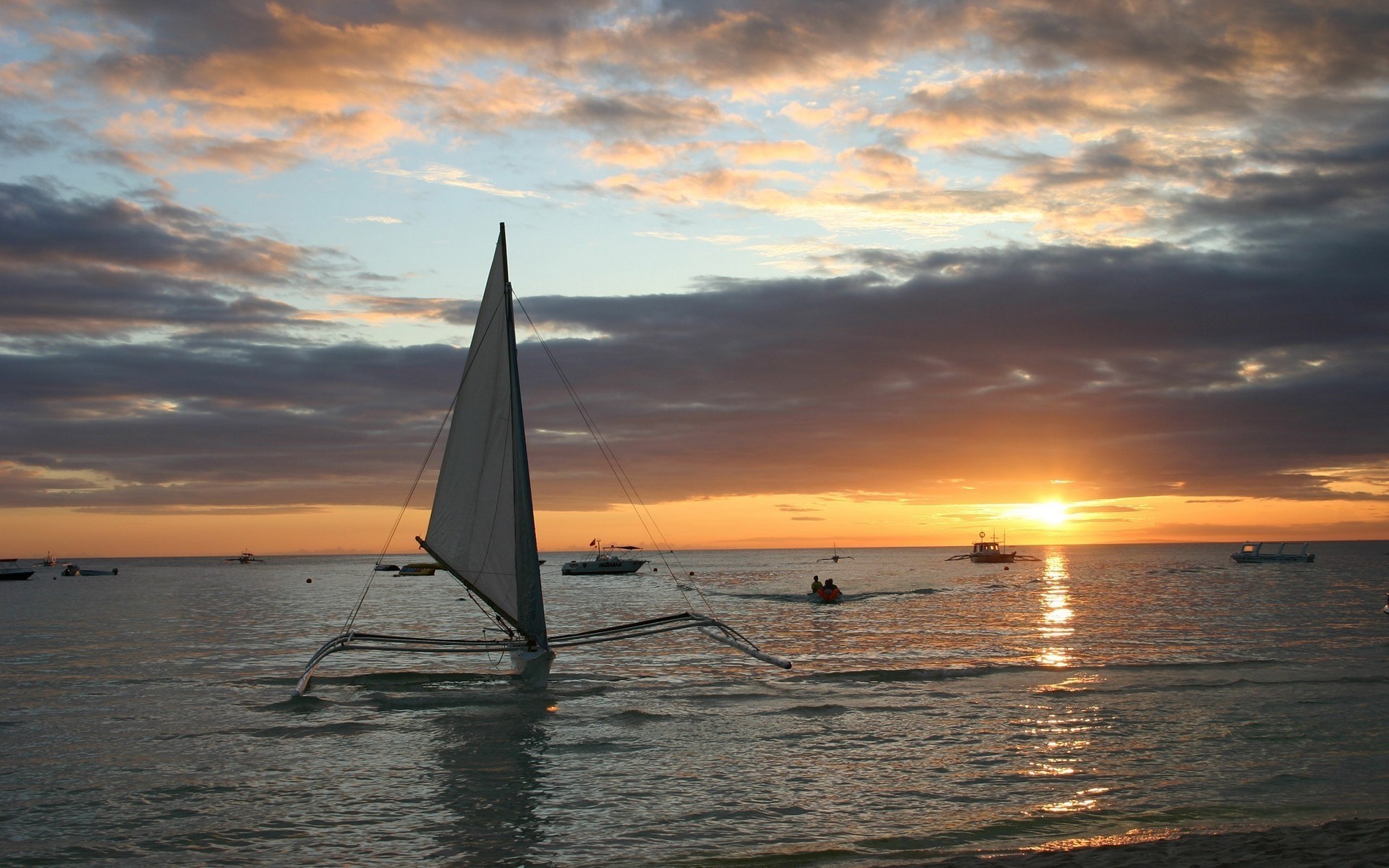 tramonto barche acqua